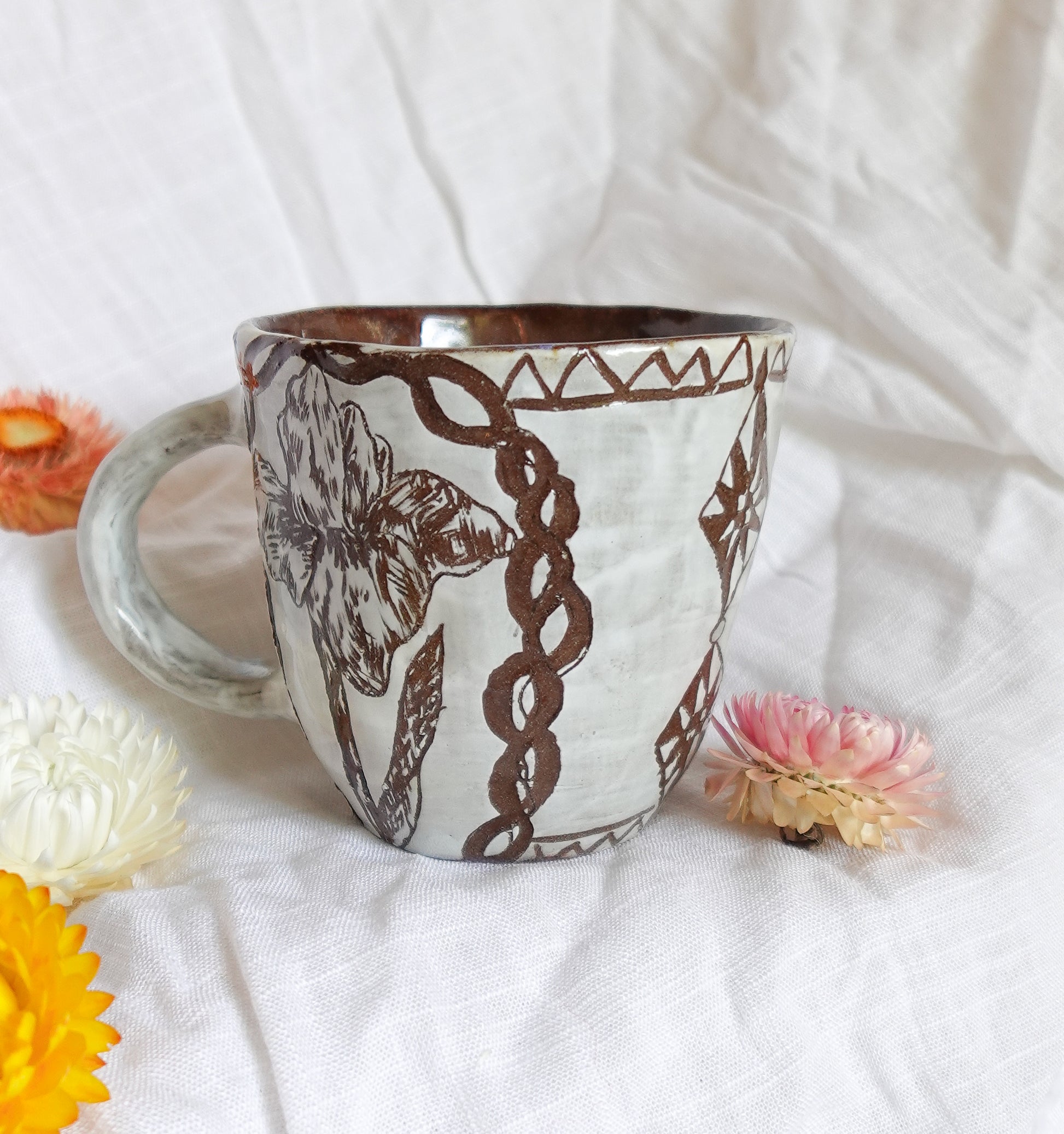 carved magpie mug