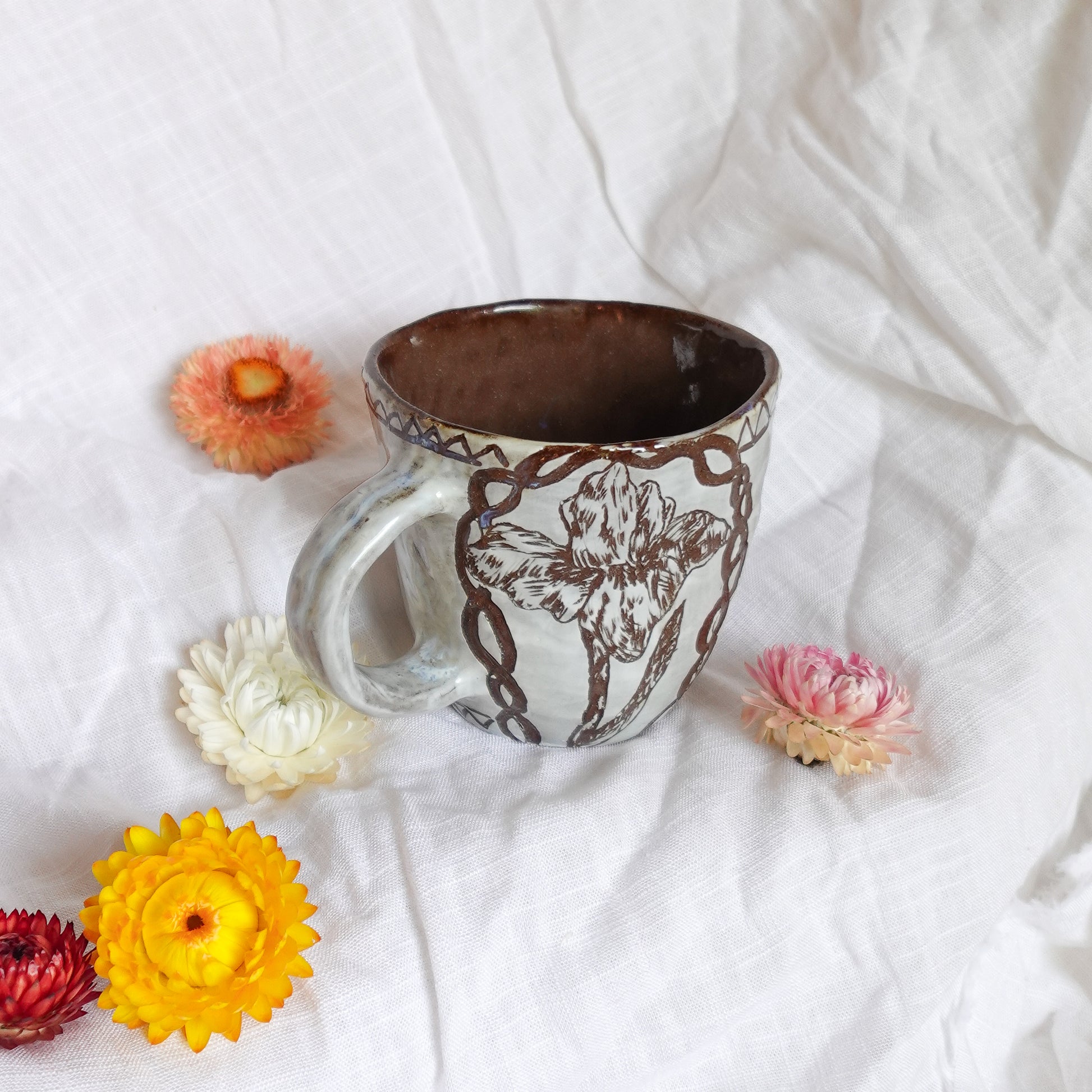 carved magpie mug