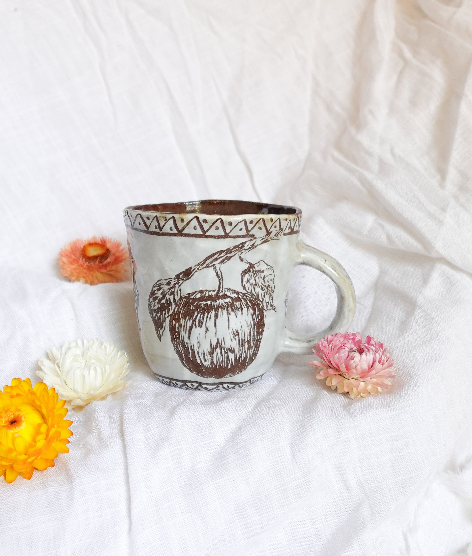 carved white apple mug