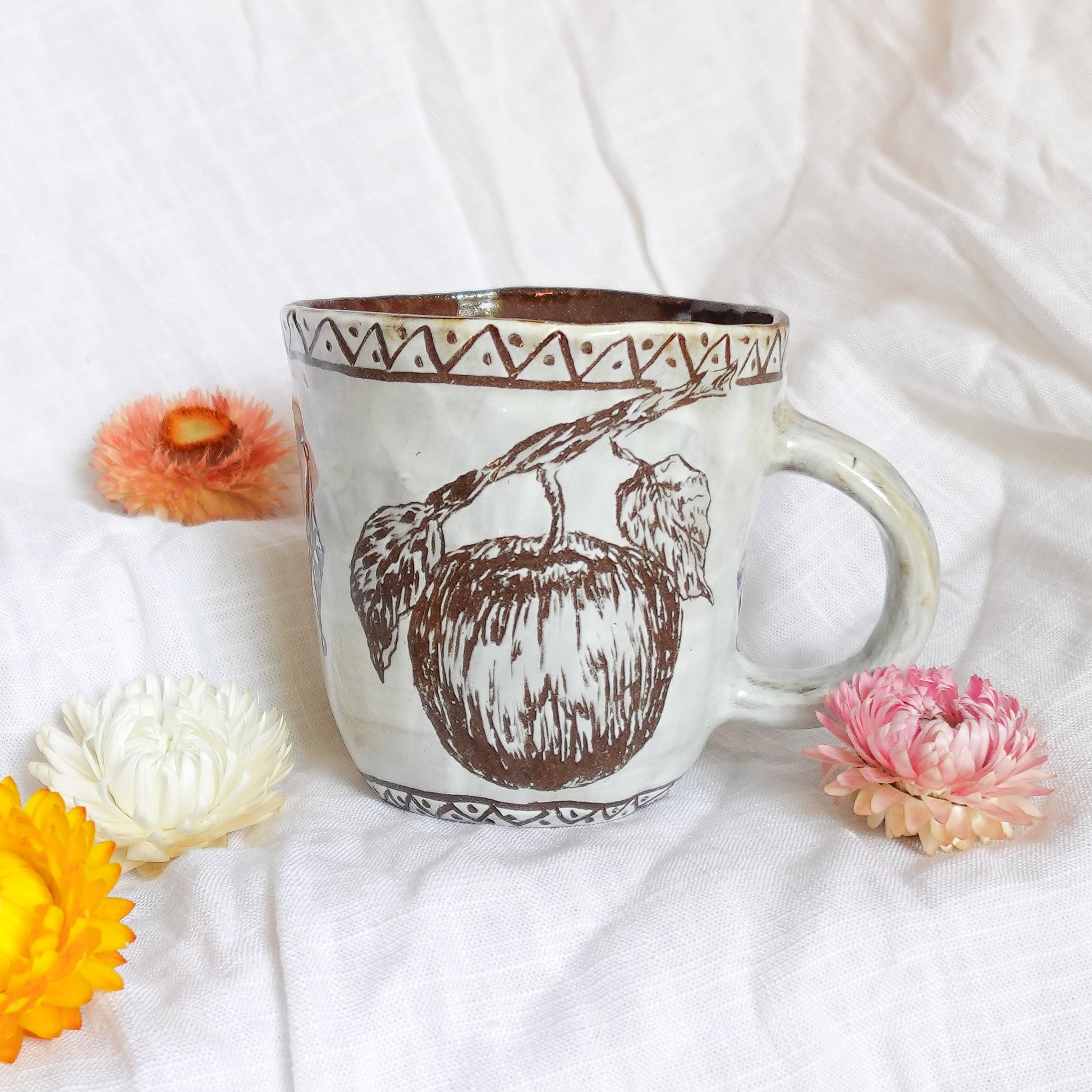 carved white apple mug