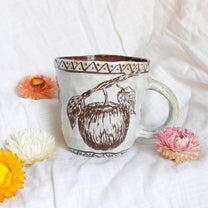 carved white apple mug