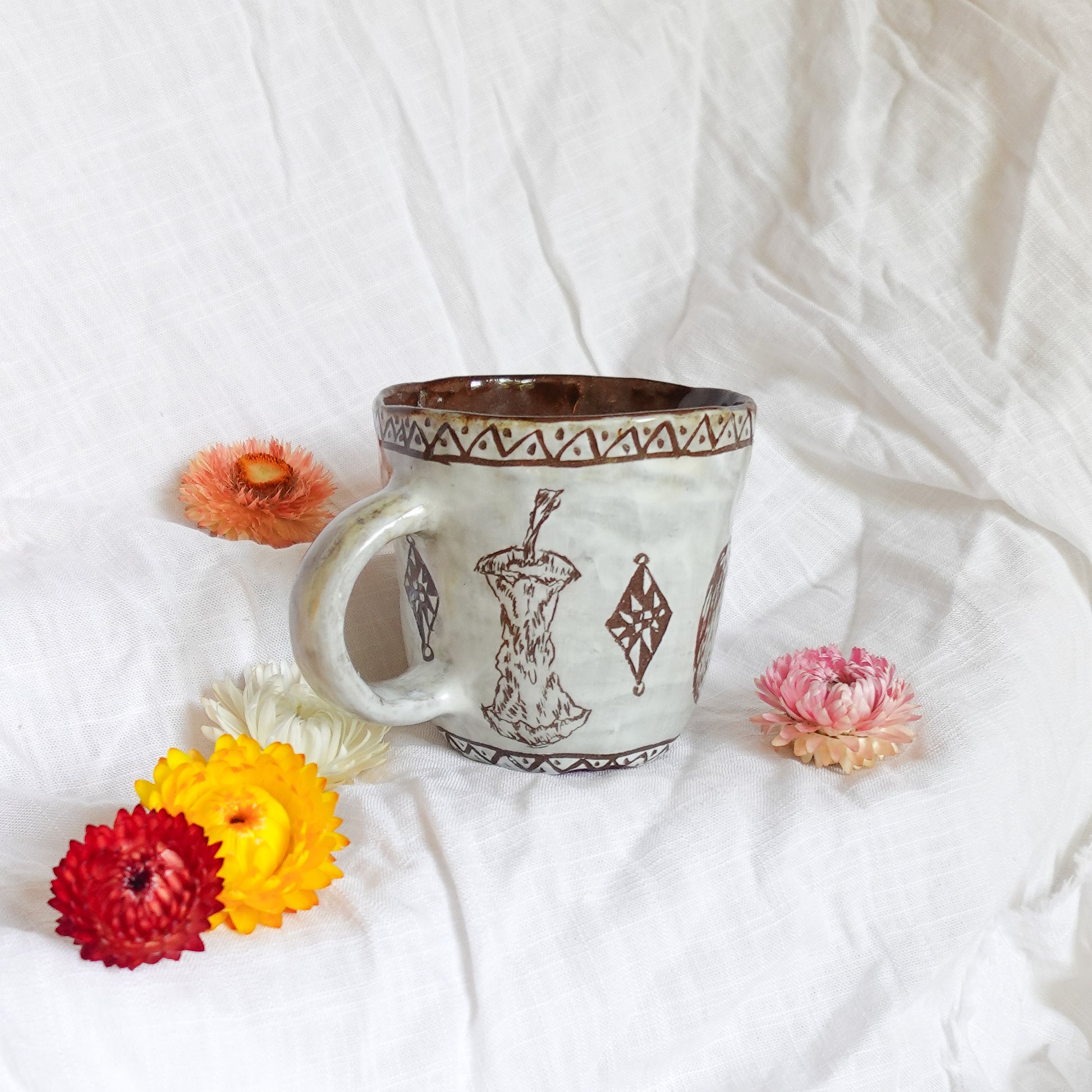 carved white apple mug