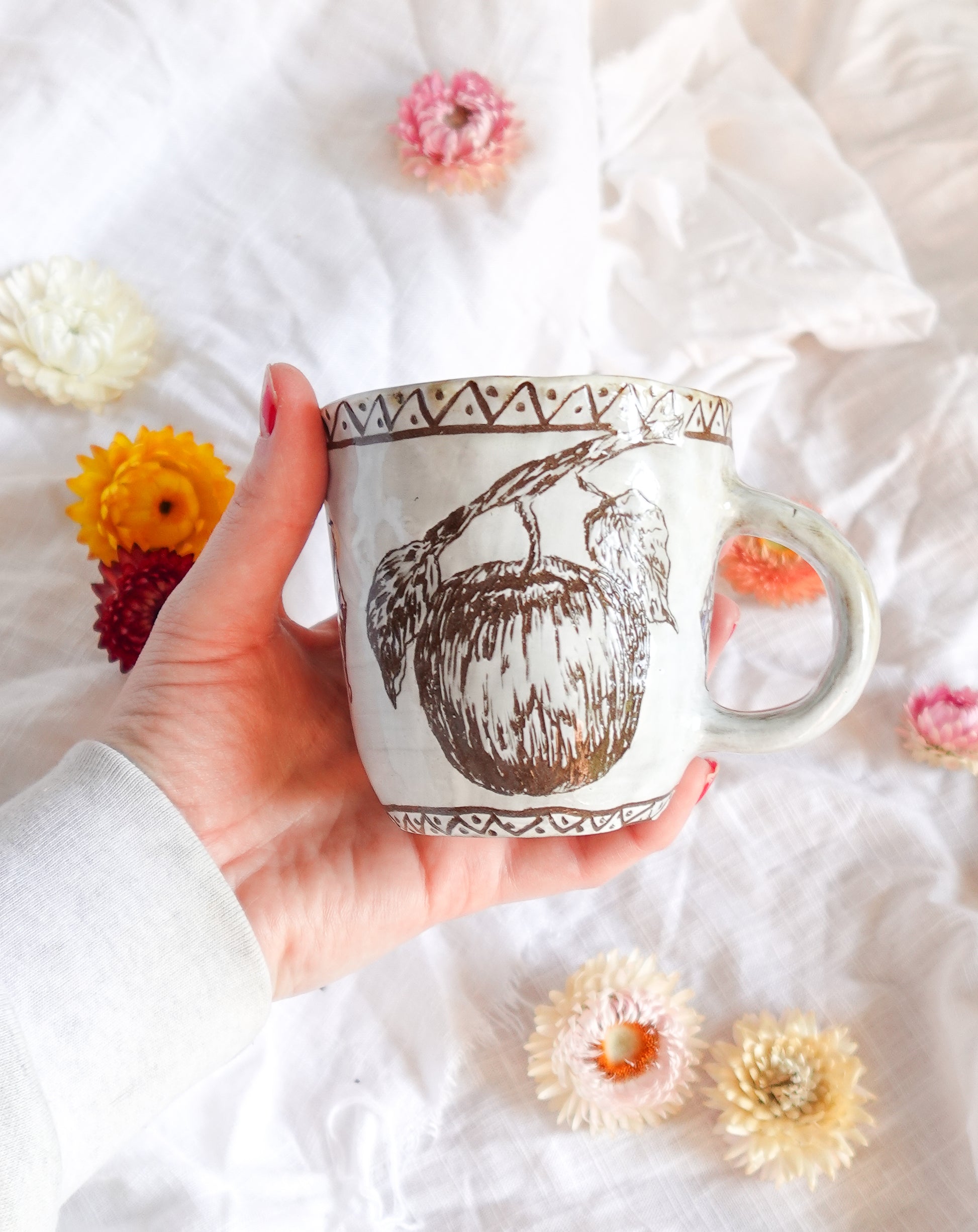 carved white apple mug