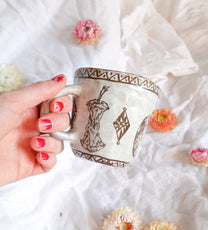 carved white apple mug