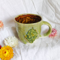 grass on the agenda mug