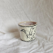 gone flying. cup
