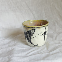 the butterflies. cup