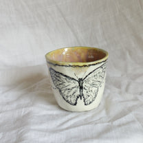 the butterflies. cup