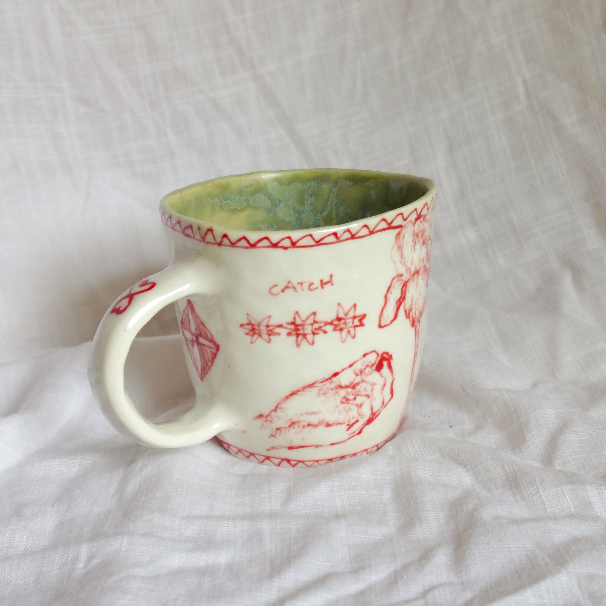 catch the hand. mug