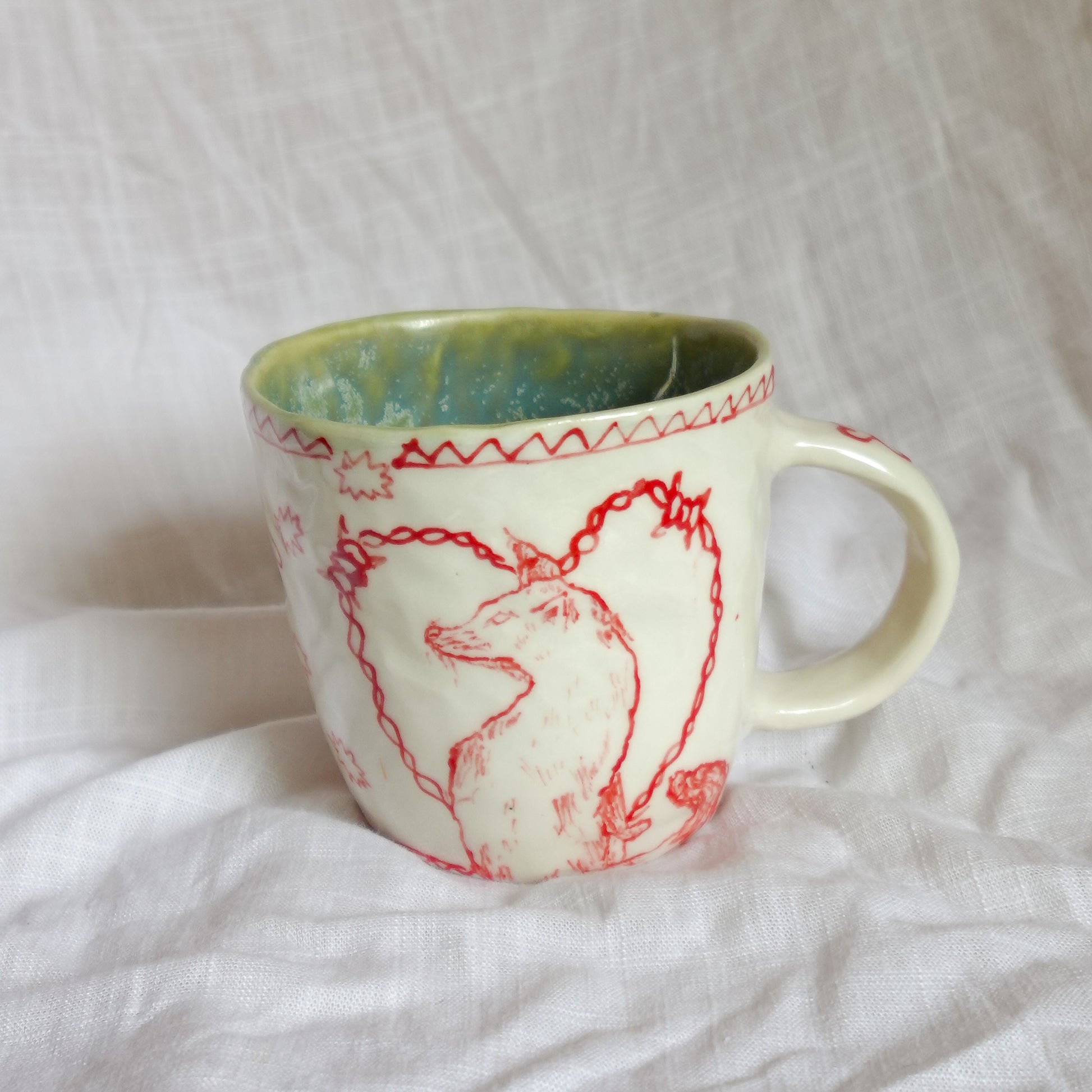 catch the hand. mug