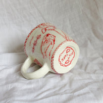 catch the hand. mug