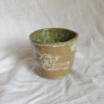 leap over. cup