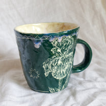outside at evening through the window. mug