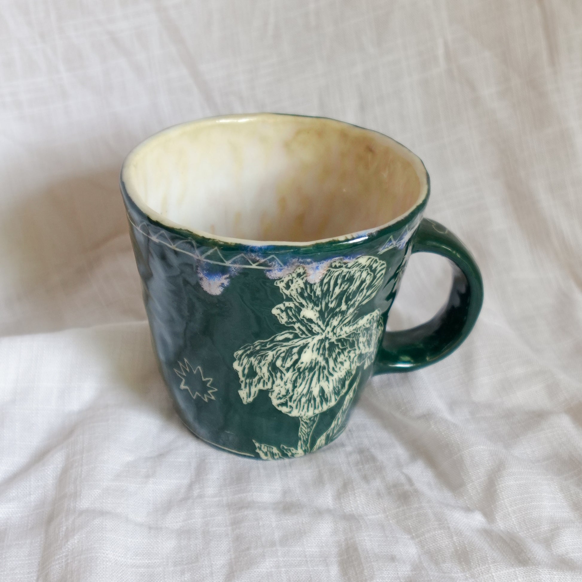 outside at evening through the window. mug