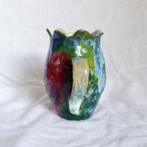 laying and looking up. vase
