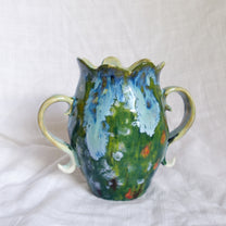 laying and looking up. vase