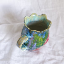 laying and looking up. vase