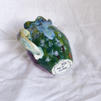 laying and looking up. vase