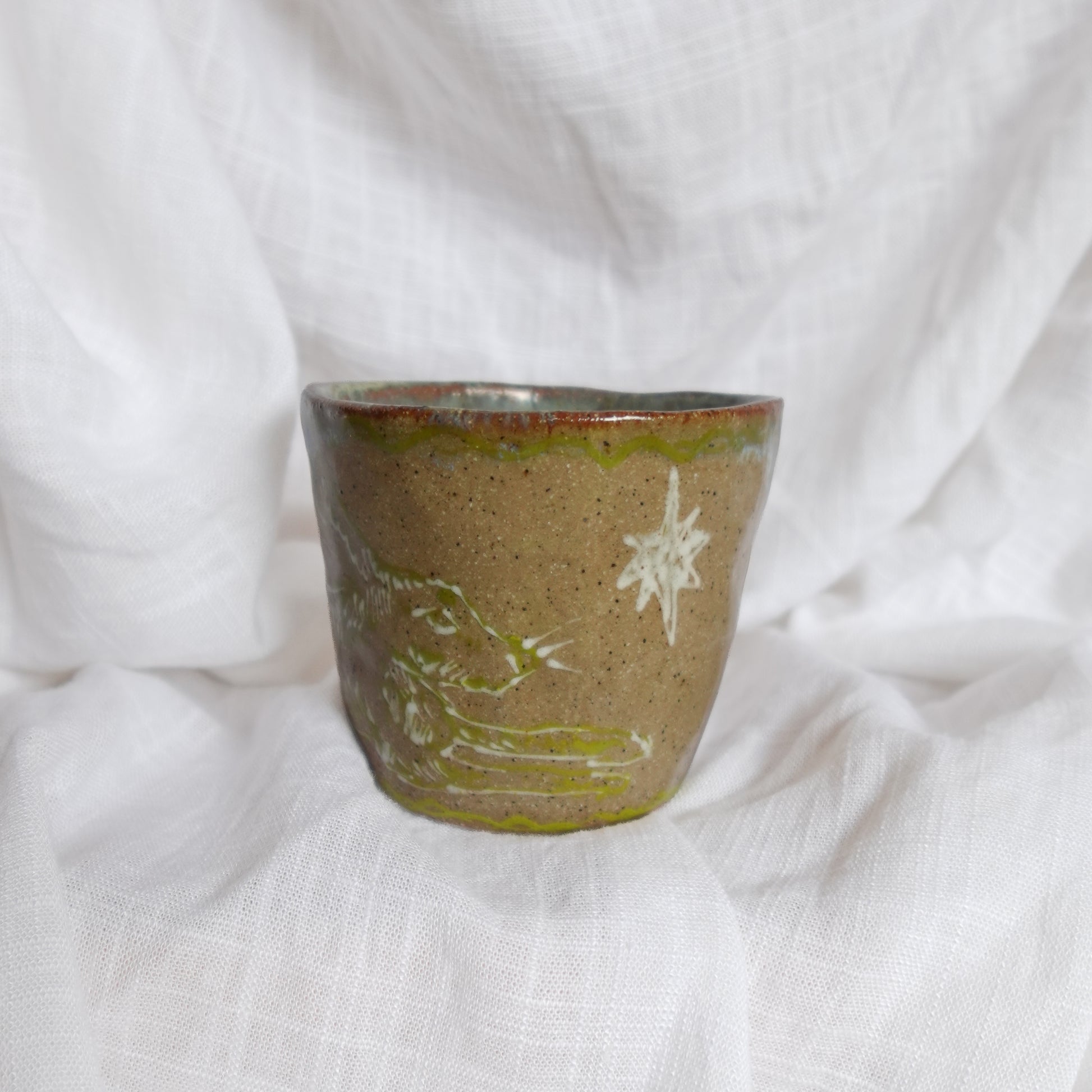 running through wet sand. cup