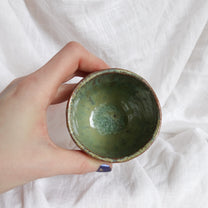 running through wet sand. cup