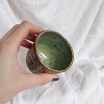 running through wet sand. cup