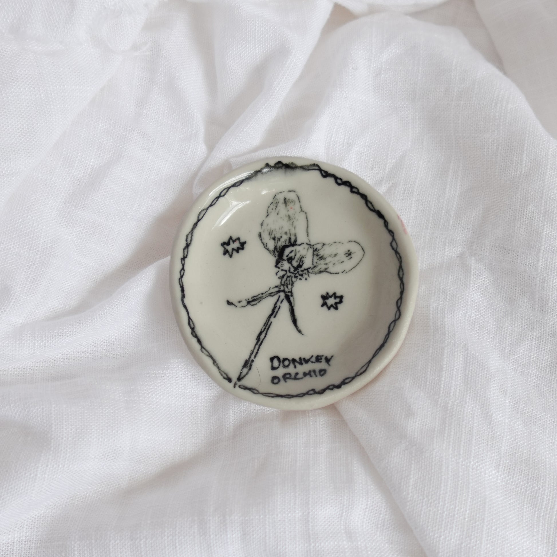 donkey orchid. trinket dish