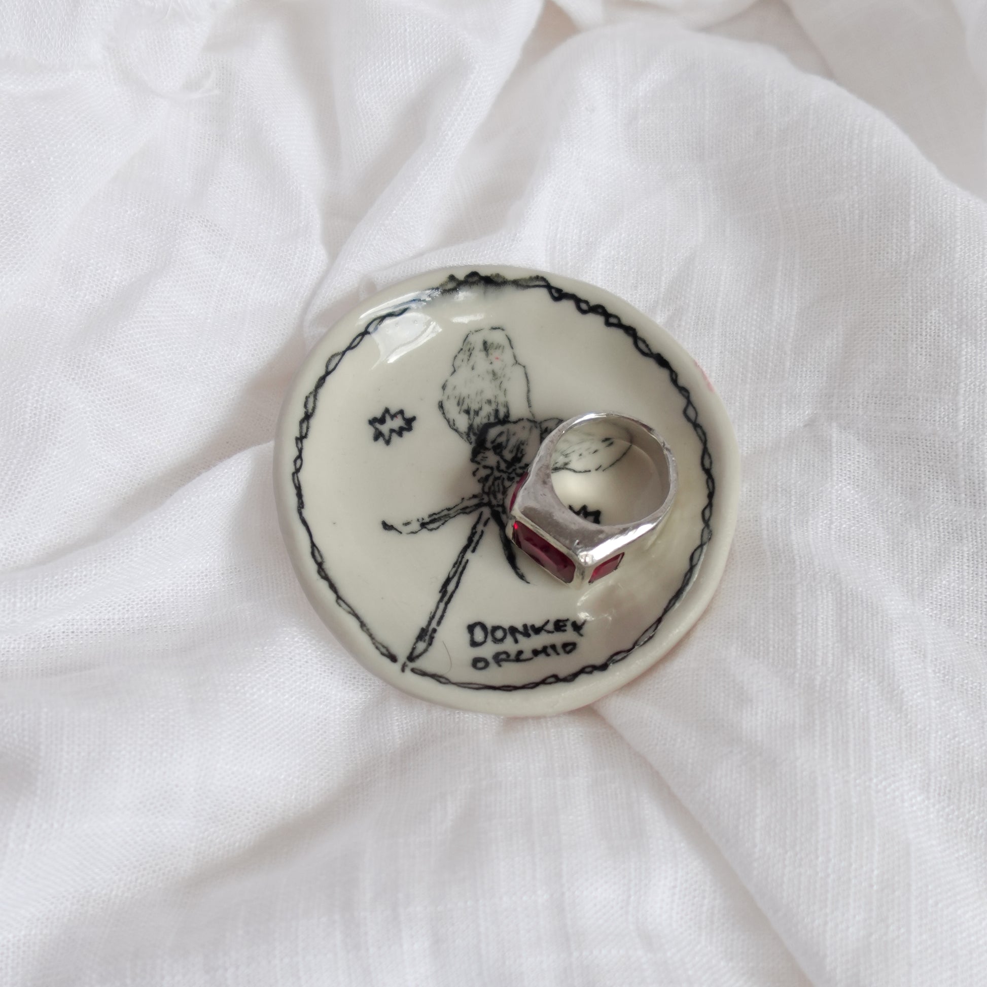 donkey orchid. trinket dish