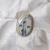 candle in the rain. trinket dish