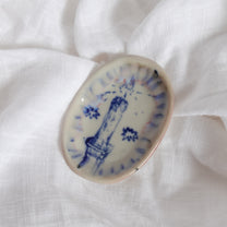 candle in the rain. trinket dish
