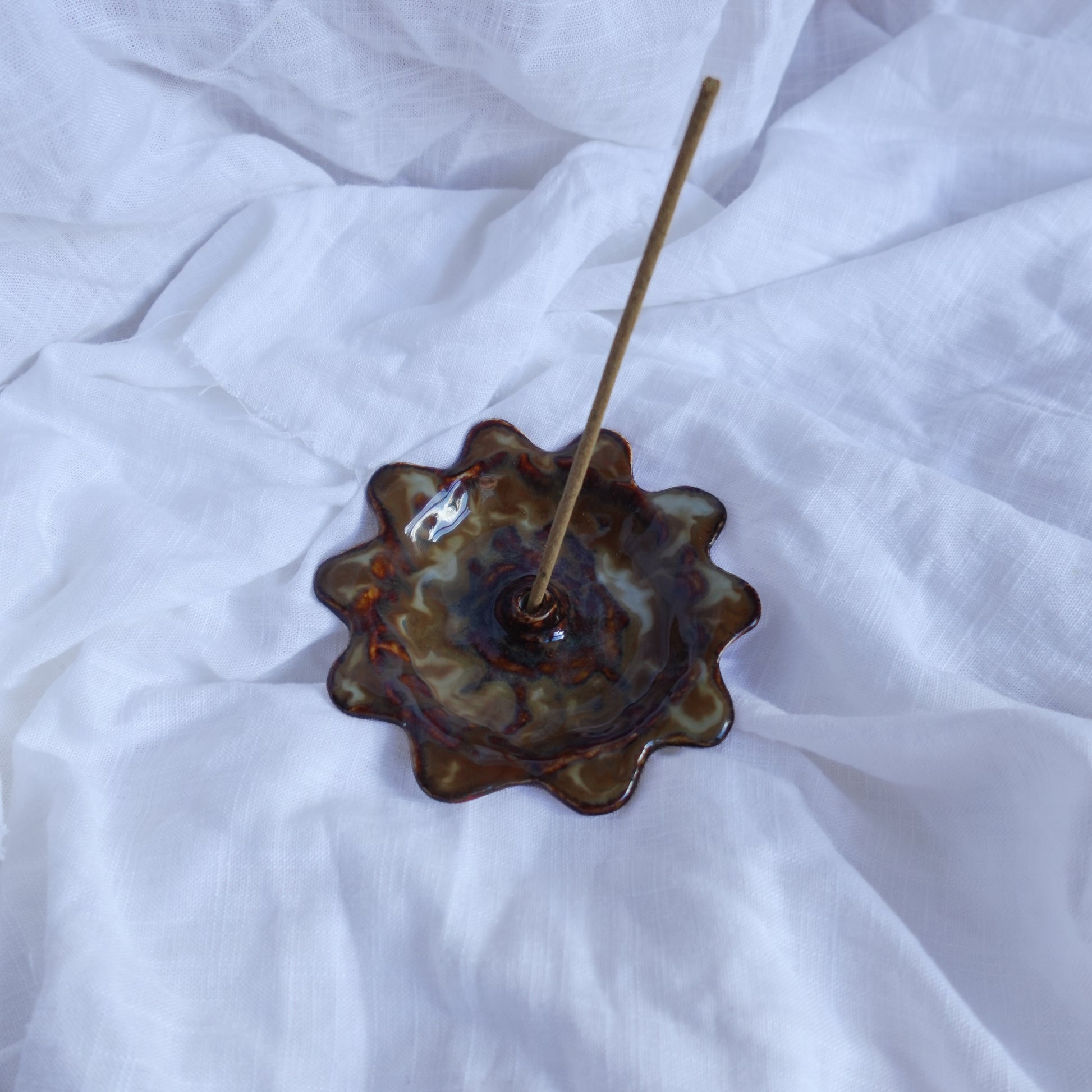 just a splash of milk. incense holder